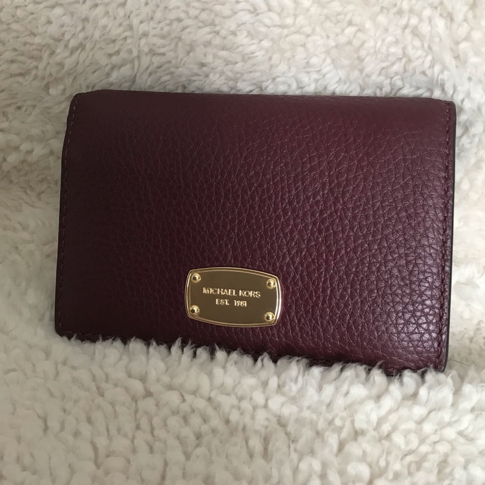 Michael Kors plum purple wallet